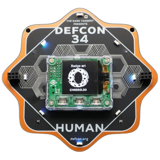 The complete DC34 HUMAN badge, with illuminated carrier and clear removable Baochip core.