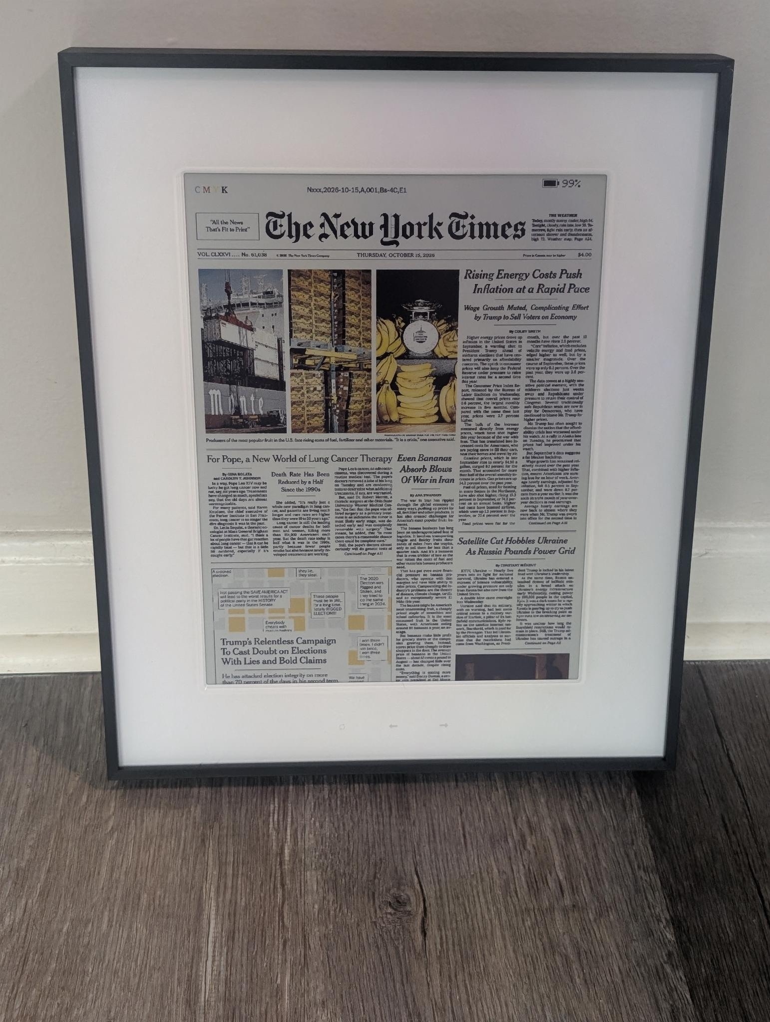 Gab's framed ePaper display showing the New York Times front page in her home.